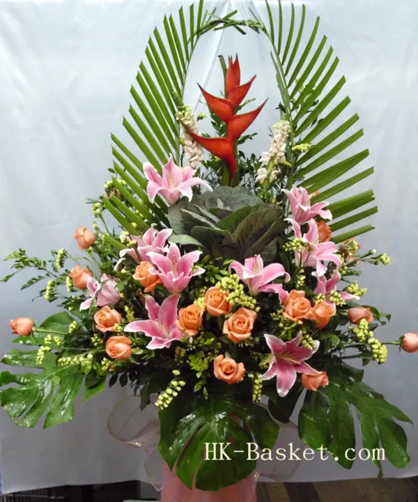 Flower arrangement  (2) - Our Prosperity Basket blooms with auspicious pink lilies and peach roses, crowned with a fiery heliconia, signifying a thriving and vibrant start.