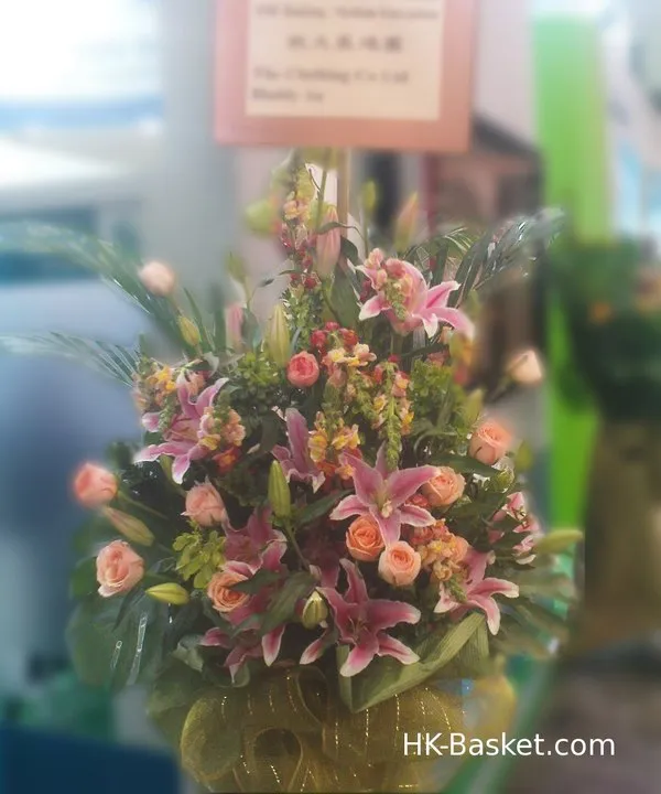 Flower arrangement  (6) - Our Blush Harmony Arrangement brims with soft pink lilies and peach roses, offering a serene and inviting look for any celebratory grand opening.