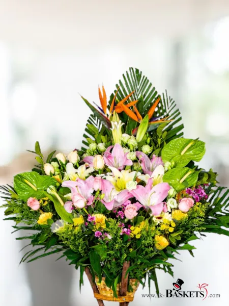 Flower arrangement  (12) - The Tropical Dream Bouquet dazzles with a lively mix of pink lilies, heliconia, and a vibrant assortment of seasonal flowers, perfect for celebrating grand occasions.